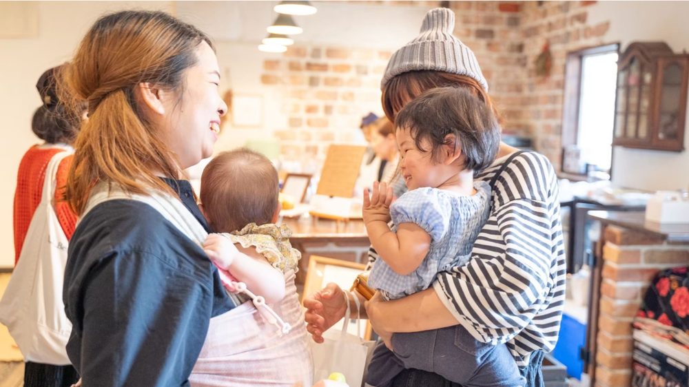 Parents and children making music together at musicand cafe in Kyoto